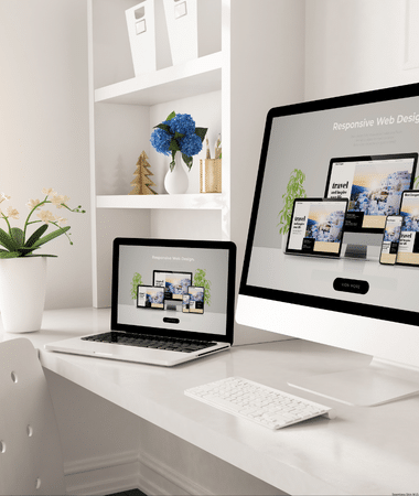 Desktop computer showing a custom automotive website designed for car dealerships and auto brands