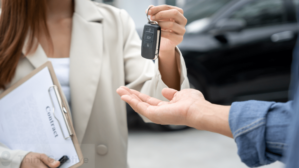 car dealership handing keys to customer illustrating why car dealerships don’t rank on Google without strong visibility